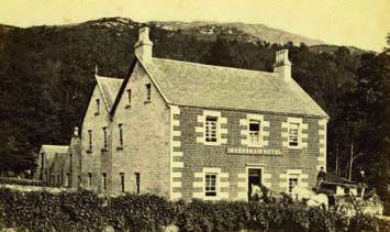 A picture of the Inversnaid Hotel in the 1880s with horse in cart outside.