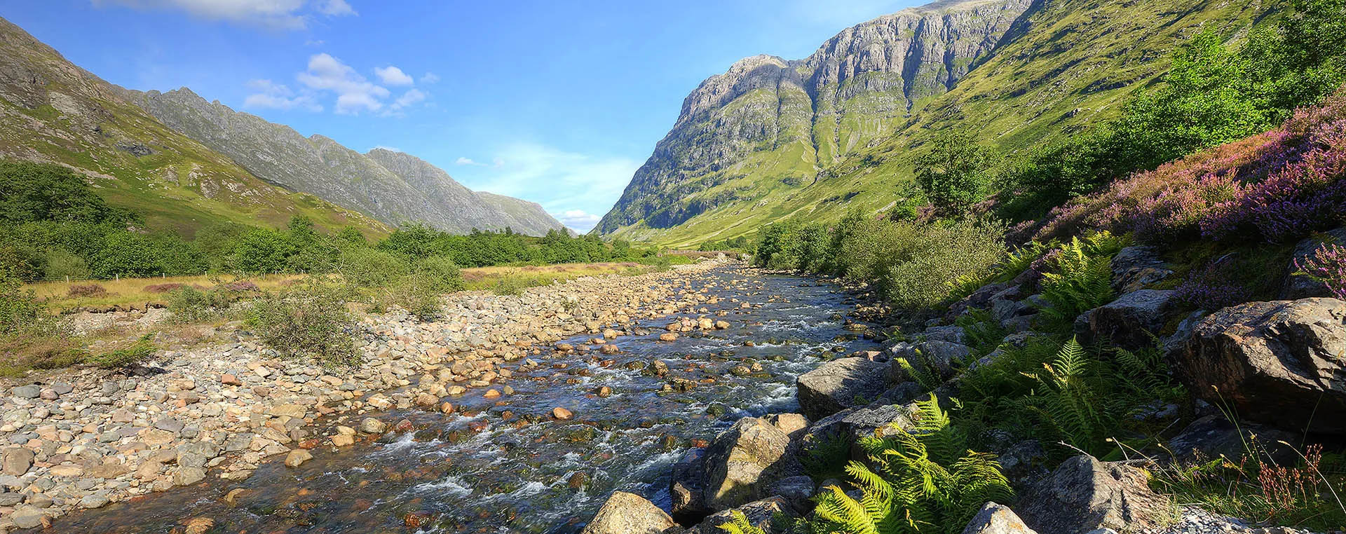 Large view of Glencoe Pass by the River Coe on a warm summers day.