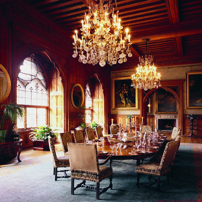 Ornate interior of Mount Stuart, featuring intricate Gothic Revival architecture and luxurious furnishings.