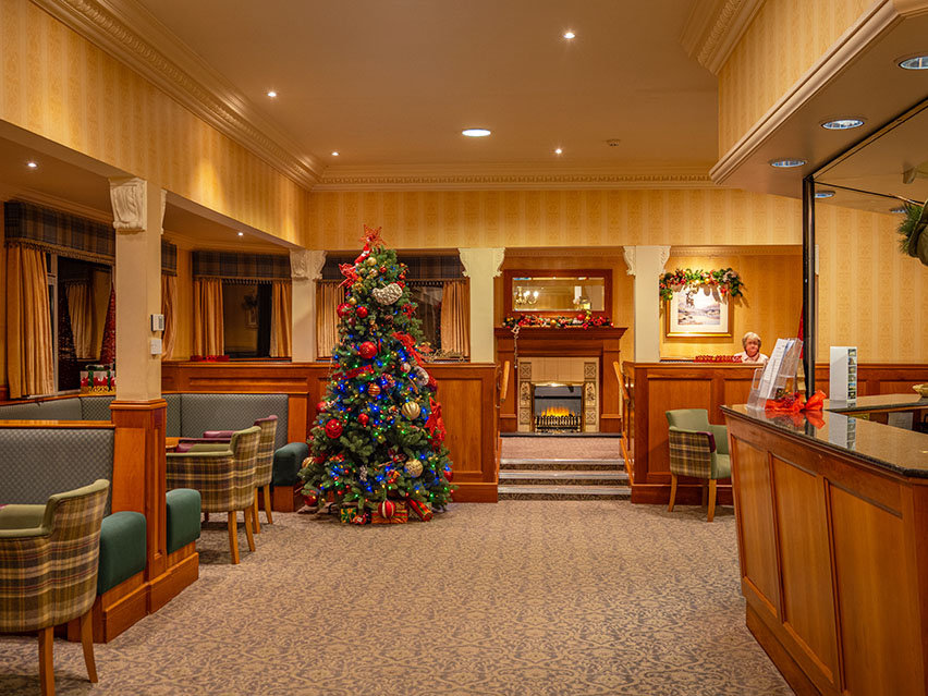 Loch Achray Hotel reception decorated for Christmas