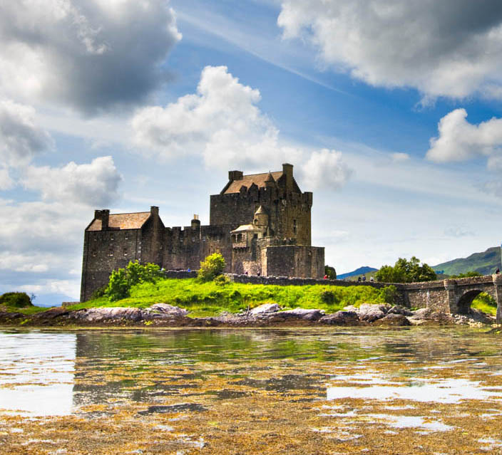 Lochs and Glens coach customer on an excursion to Eilean Donan Castle.