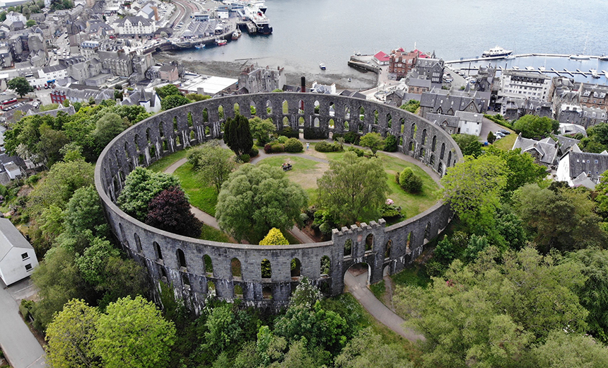 Aerial view of McCaig's Tower in Oban during summer