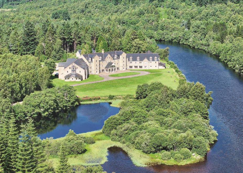 An aerial view of Loch Tummel hotel situated on the banks of Loch Tummel